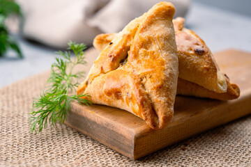 Homemade triangular pastry with spinach and cheese. A traditional Middle Eastern dish.