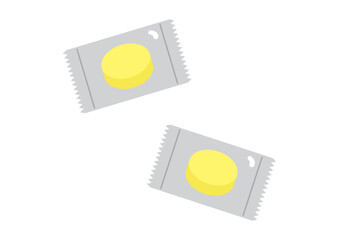 個包装の黄色いあめ、2袋