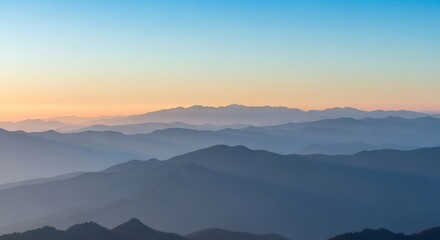 Serene Mountain Range at Dawn - A Breathtaking Vista of Layers and Light.