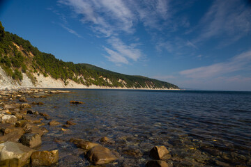 Blue sea, mountains, blue sky, rocks
