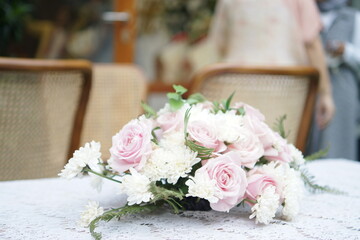 Elegant Pink and White Floral Arrangement on a Table