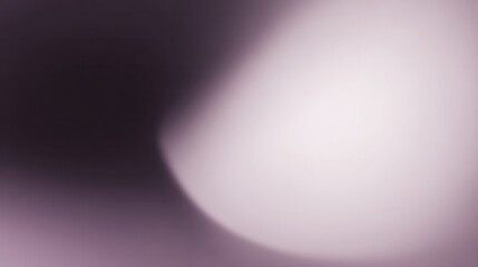 Soft light glows on a muted purple background with smooth gradients.