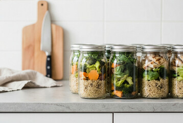 Healthy Meal Prep in Glass Jars on Kitchen Counter