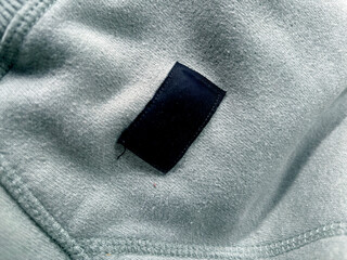 Close-Up Of Black Tag On Fabric