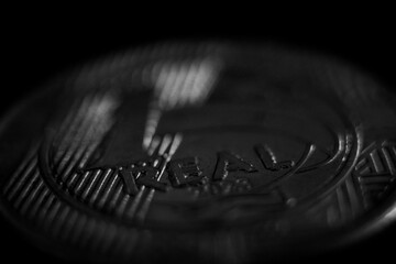 black and white photograph of a coin