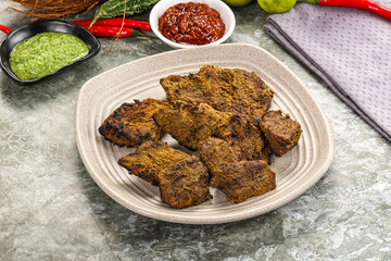 Grilled beef barbecue with spises