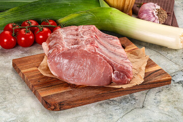 Raw pork loin cut with bone