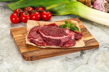 Raw beef cheeks cut for cooking