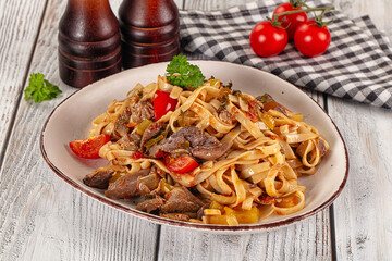Asian udon noodles with beef