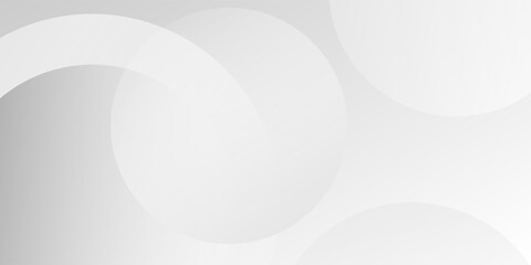 A minimalist abstract background featuring overlapping curves and circular shapes in various shades of gray, creating a smooth gradient and subtle depth