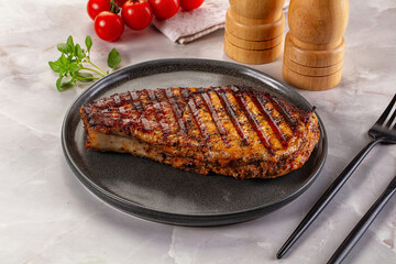 Grilled pork steak with bone