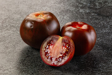 Raw juicy sweet tomato Kumato