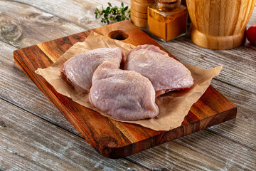 Raw chicken thighs for cooking