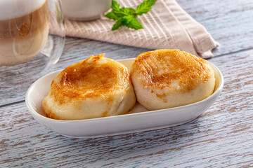 Fried homemade cottage cheese syrniki