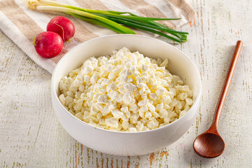 Grain cottage cheese in the bowl
