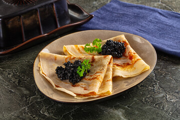 luxury pancake with black caviar
