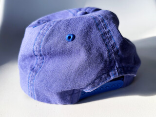 Close-Up Of Blue Fabric Cap From Back