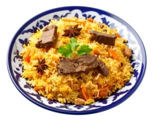 A vibrant plate of flavorful rice pilaf garnished with herbs, spices, and tender pieces of meat served on a decorative dish