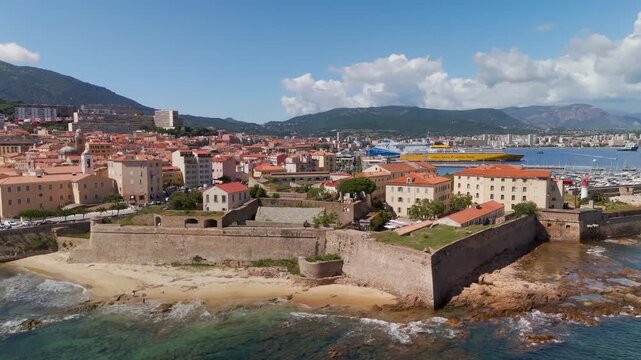 Smooth Aerial Drone Circling Shot Around the Historic Ajaccio Citadel Fortress, Revealing the Old Town, Harbor, and Mediterranean Coastline in Corsica, France.