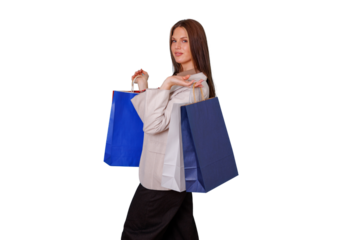 Woman holding shopping bags after purchasing items, looking at camera and enjoying consumerism with a transparent background
