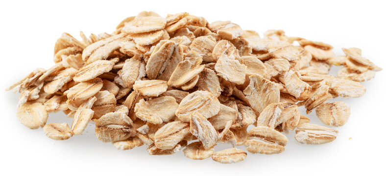 Rolled oat flakes isolated on white background. Macro shoot. File contains clopping paths.