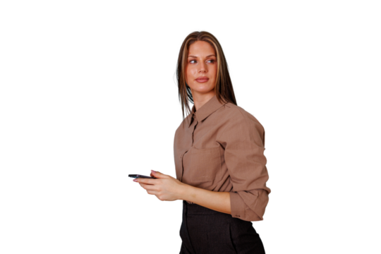 Businesswoman looking back while holding phone, engaging with content, communication technology - Powered by Adobe