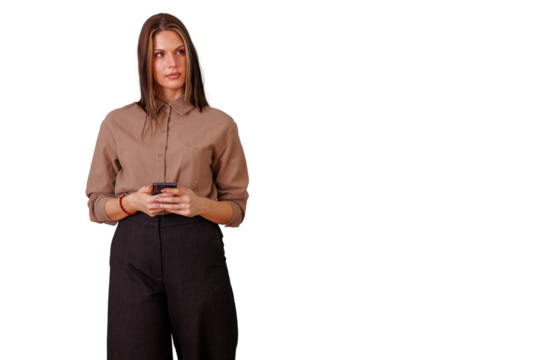 Elegant businesswoman holding smartphone, looking away, thinking about notifications and new ideas, transparent background