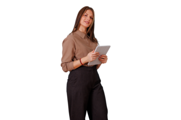 Businesswoman using a tablet, standing and smiling. Professional young woman engaging with digital technology on transparent background