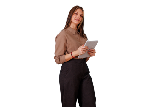 Businesswoman using a tablet, standing and smiling. Professional young woman engaging with digital technology on transparent background