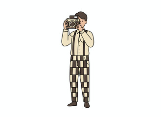 Cheerful hipster girl holding a camera takes a photo in a flat vector illustration; a funny young woman, an amateur photographer, stands alone on a white background with modern equipment, looking