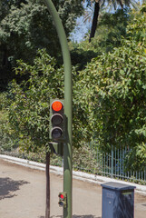 Red traffic light with control box beside