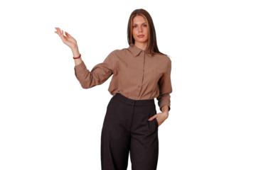 Confident young businesswoman presenting and gesturing to the side, looking at camera in smart casual clothing, transparent background