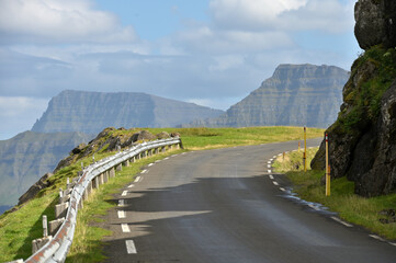 An empty, lonely, narrow road in the Faroe Islands