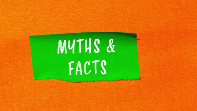Myths and facts message writing on ripped torn paper background