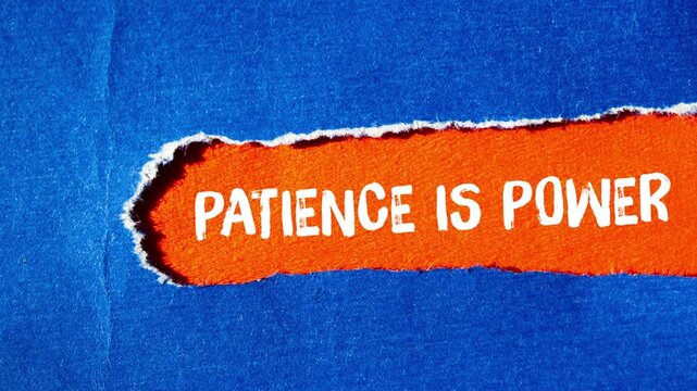 Patience is power message writing on ripped torn paper background