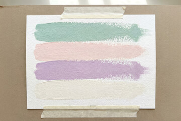 Pastel color palette on paper with natural light