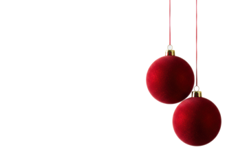 three suspended matte velvet-red christmas baubles close-up, isolated against a transparent background with copy space, razor sharp, minimalist holiday decoration concept
