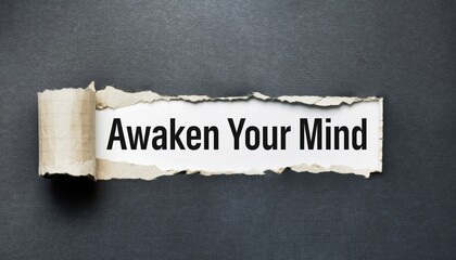 Personal Growth Concept Featuring "Awaken Your Mind" Message on a Creative Paper Rip; Suitable for life coaching presentations, educational posters, and motivational social media posts.
