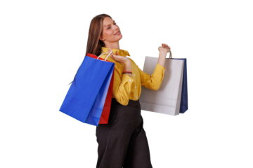 Happy woman holding colorful shopping bags after successful purchases and enjoying retail therapy on transparent background