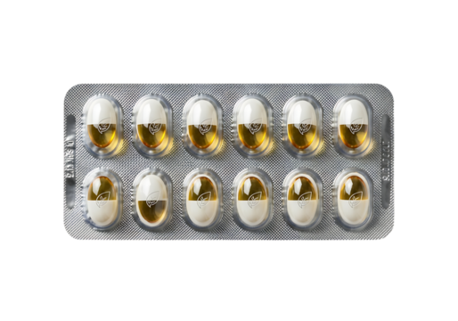 A blister pack containing twelve white and gold capsules isolated on transparent background