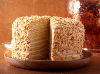 layered honey cake with cream filling