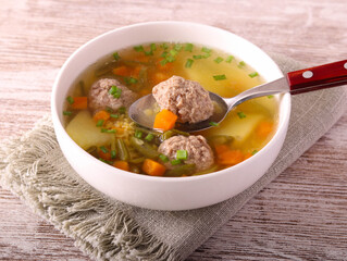 Meatballs and mixed vegetable soup
