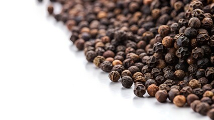 Whole Black Peppercorns Lightly Scattered