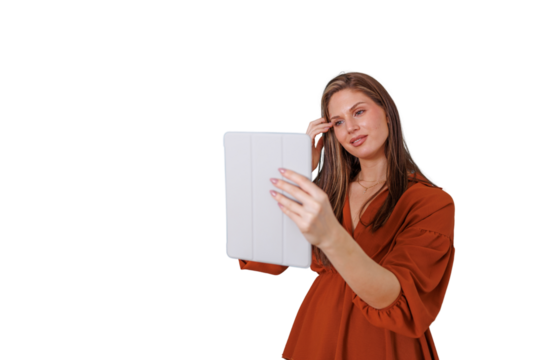 Woman holding a tablet, video chatting or taking a selfie, engaging in digital communication, with transparent background