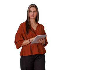 Professional woman standing, holding a tablet, using digital technology for business communication, transparent background