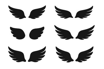 Diverse collection of stylized black wings in silhouette graphic elements