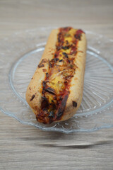 Delicious baked sandwich with melted cheese and fresh tomato sauce