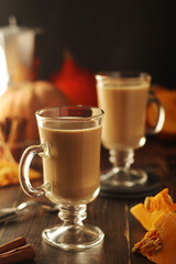 Glasses with warm pumpkin latte