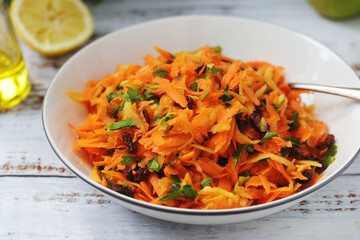 A bowl with traditional Polish carrot salad	