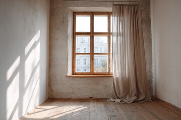 Fototapeta premium Natural light streams into an empty room through a vintage window with sheer curtains.
